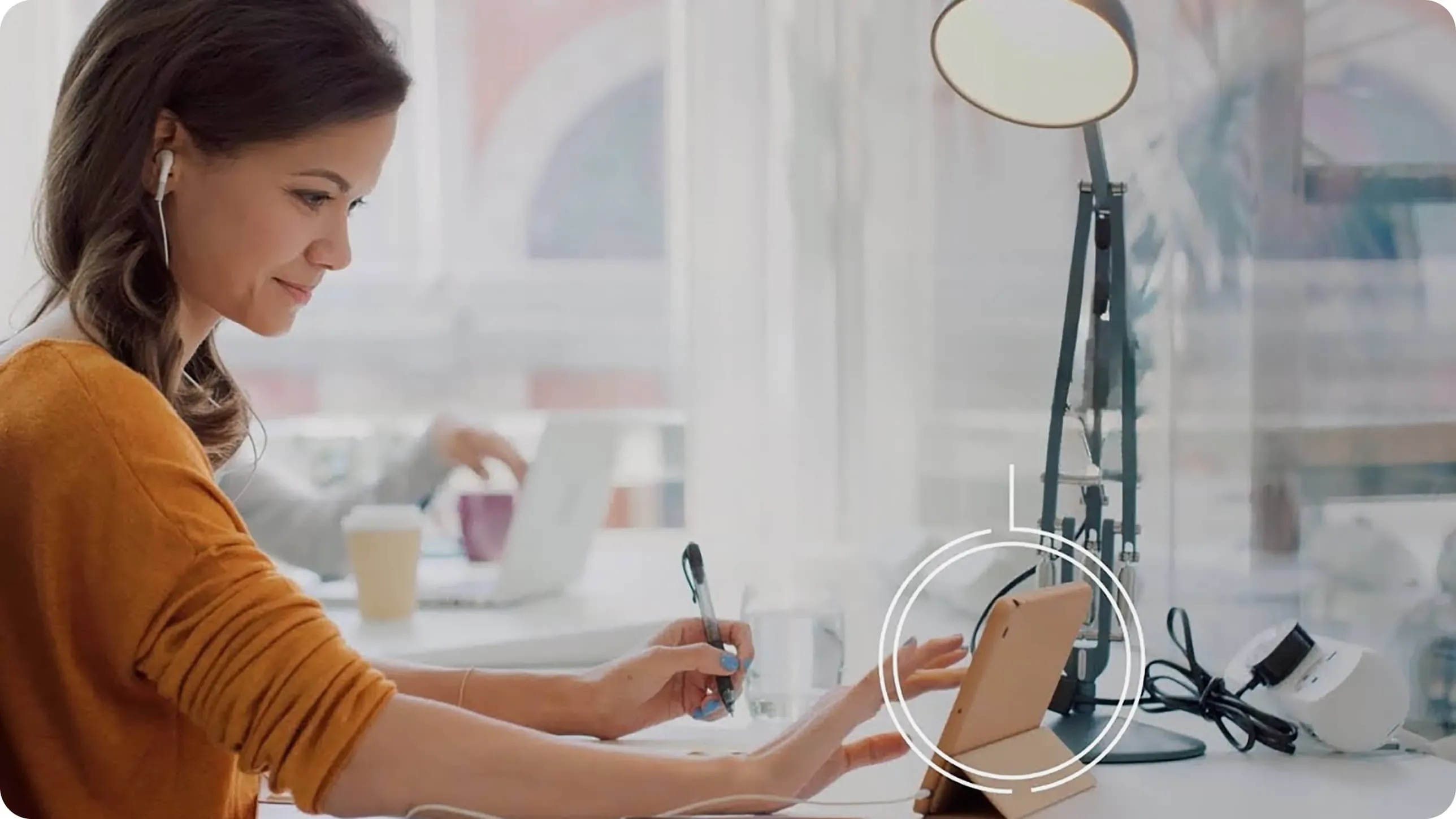 Play Video: A woman using a tablet for work