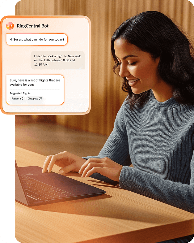 A person typing at a laptop, asking a RingCentral chatbot to help her book a flight to New York 