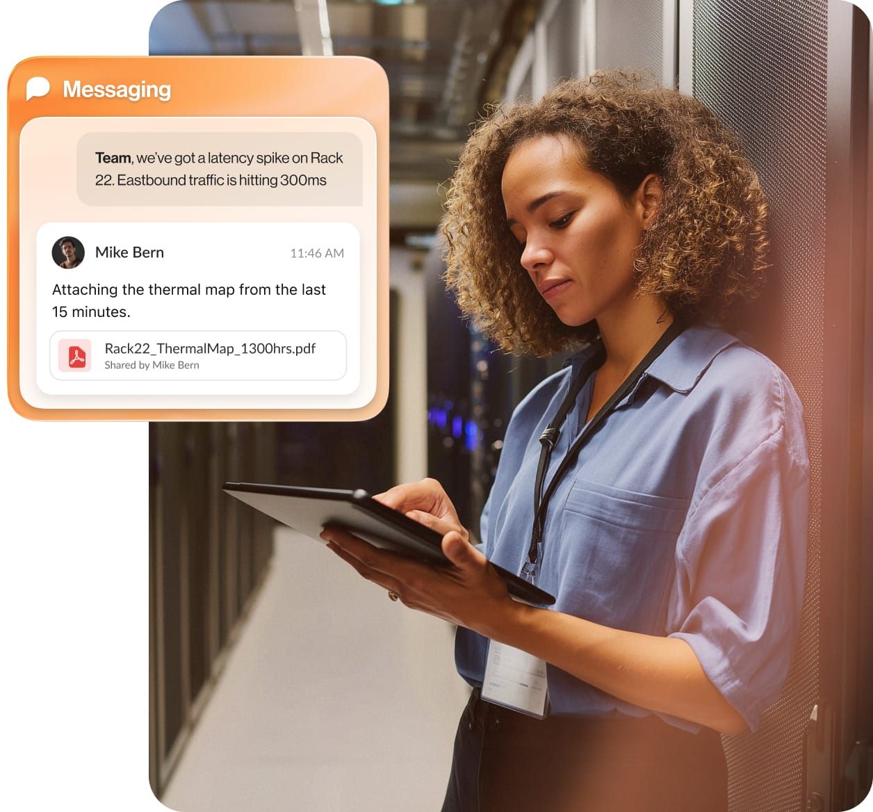 A female worker at a data center is messaging on her tablet device.